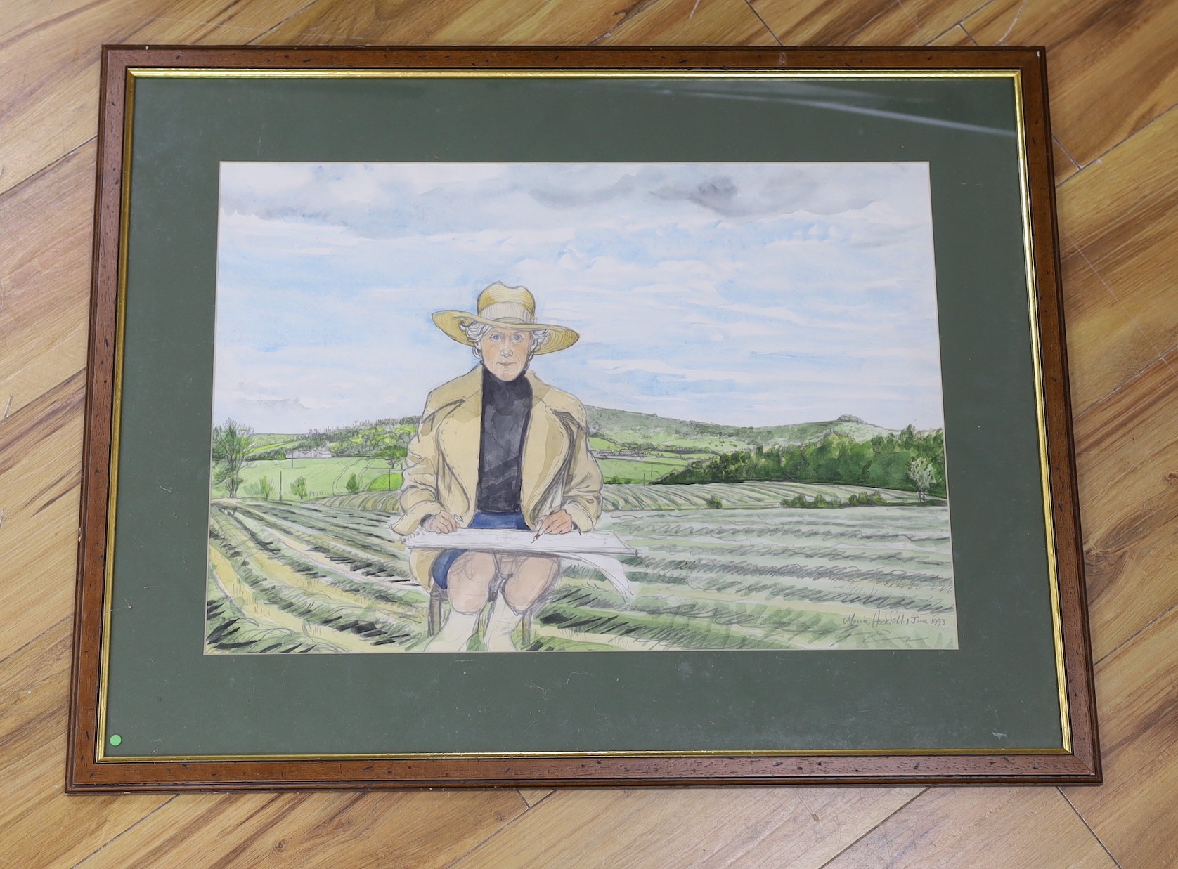 Moira Hoddell, pencil and watercolour, Self portrait sketching in a field, signed and dated 1993, 40 x 56cm
